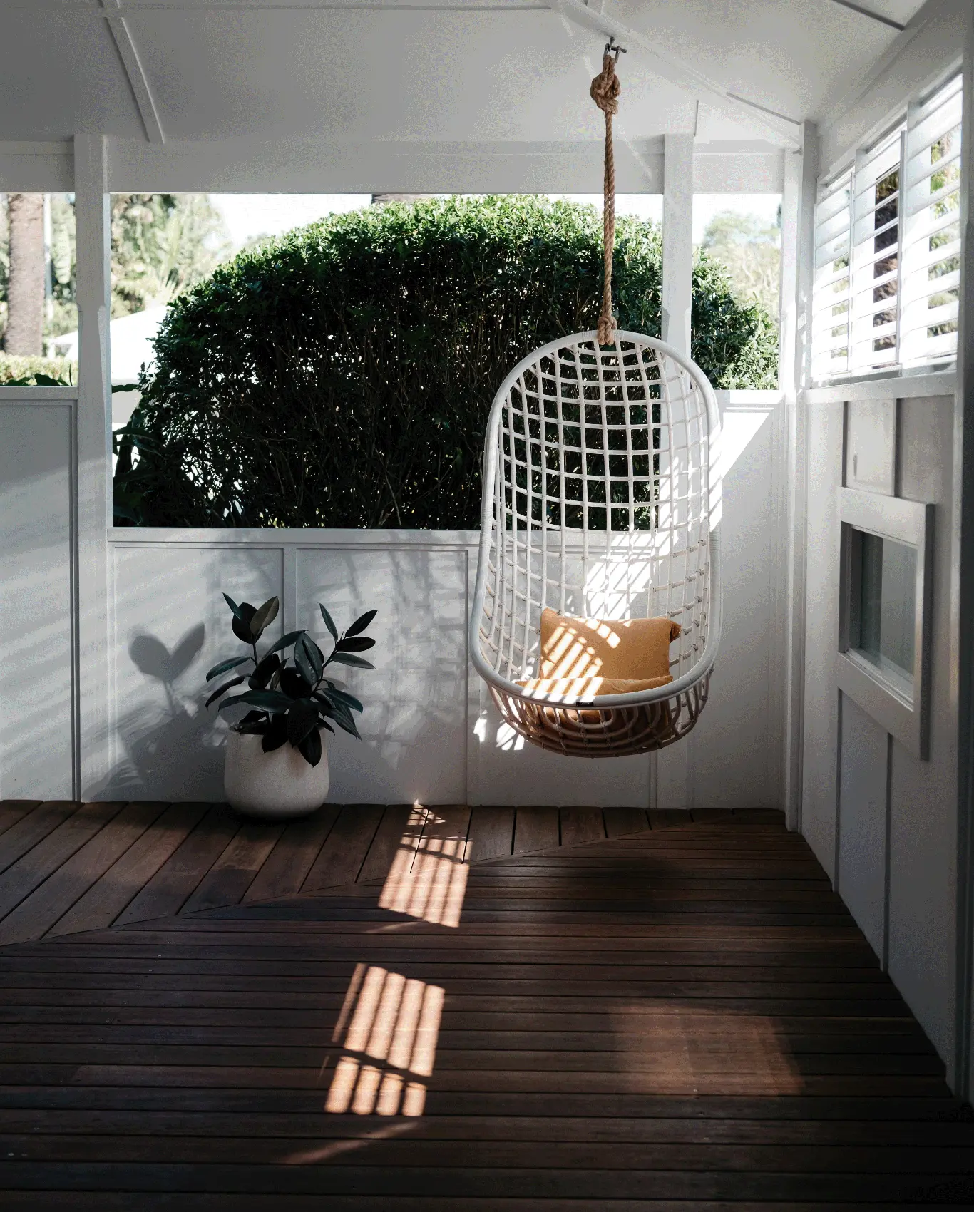 Porch with swinging chair